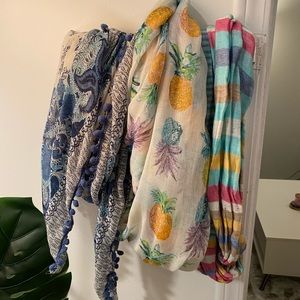 Three colorful scarves